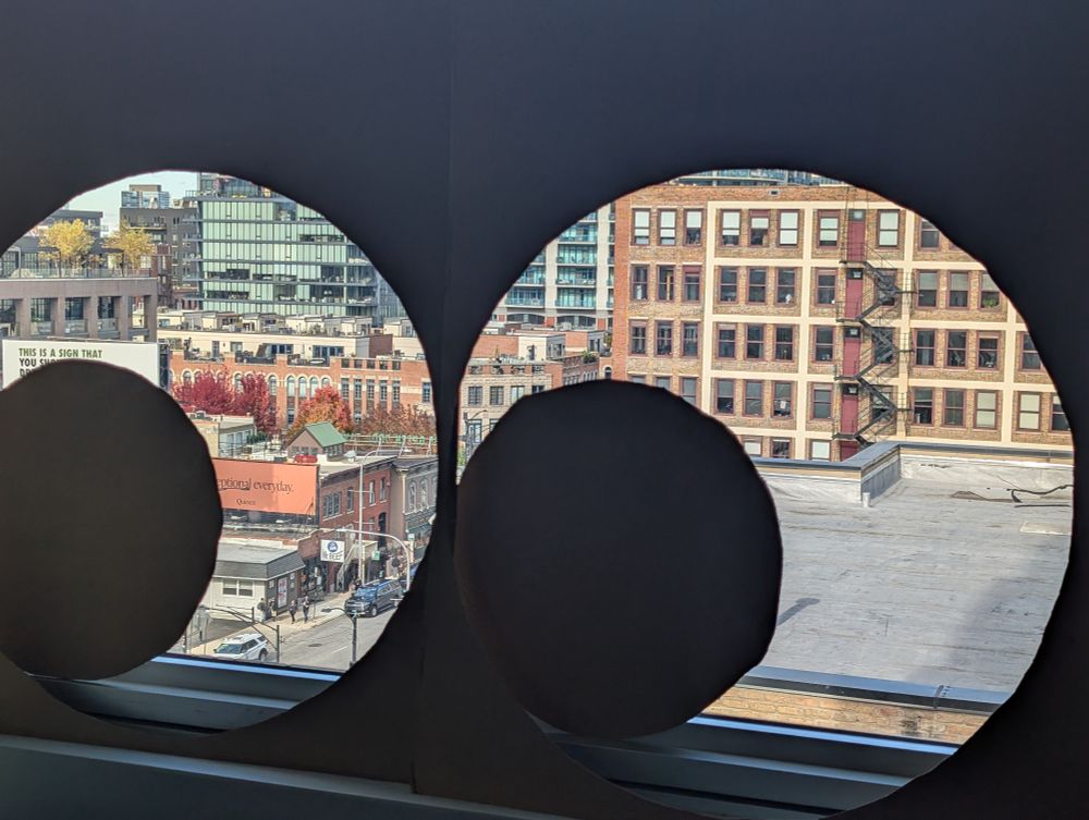 A huge set of cardboard eyes placed on my windowsill overlooking Mr Beef
