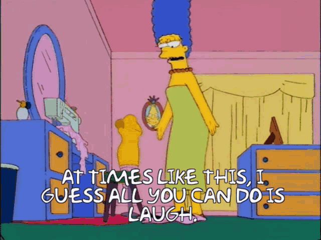 Simpsons gif in which marge Simpson says ‘at times like this I guess all you can do is laugh’ before sitting down, staring into space with a blank expression. 