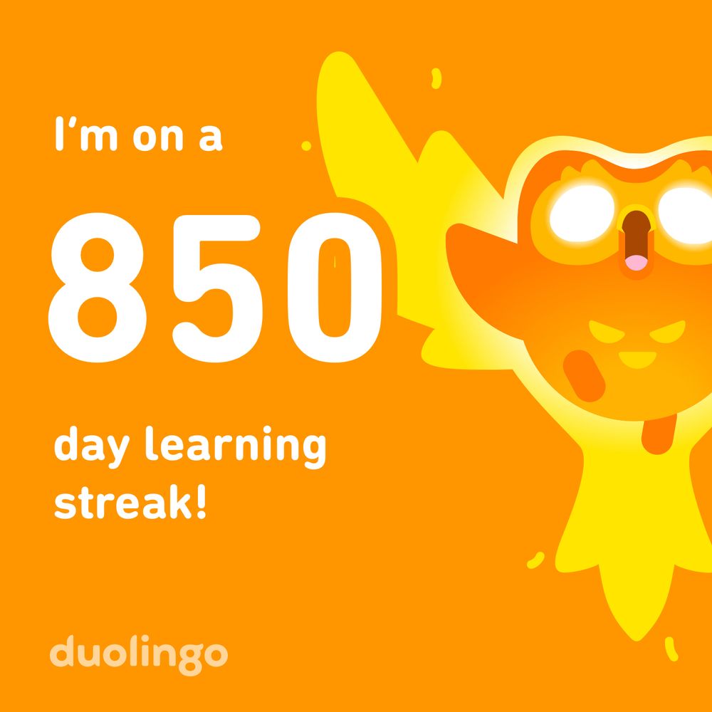 “I’m on a 850 days learning streak” image from Duolingo. 
Orange background, white writing, duo, the owl, appears as a phoenix 