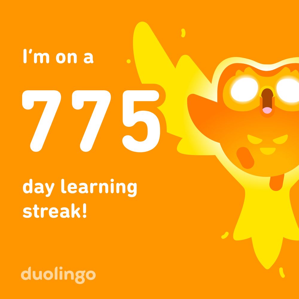 Duolingo daily learning streak of 775. 
Image from the app has orange background, white writing and Duo, the owl, surrounded by flame like a phoenix 