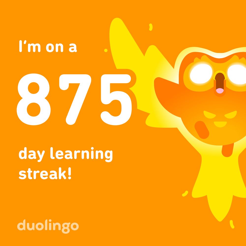 I’m in a 875 day learning streak. Orange background, white writing. Duo the owl looks to be surrounded by flame wings, like a phoenix 