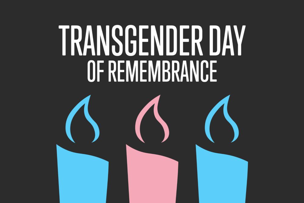 Transgender Day of Remembrance with three candles colored blue and pink