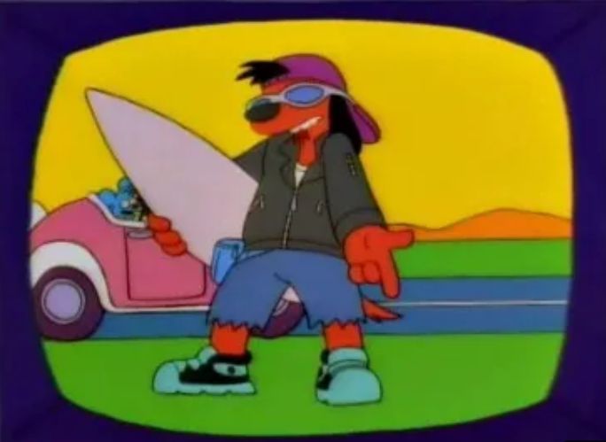 Poochie, de los Simpson (de Rasca y Pica, en realidad), un perro que intenta ser la triple destilación de lo que se consideraba molón en los 90. Lleva la gorra para atrás (con mechón de pelo saliendo hacia delante, como el gilipipas este del opus), gagas de sol, chupa de cuero, pantalones grunge y una tabla de surf.