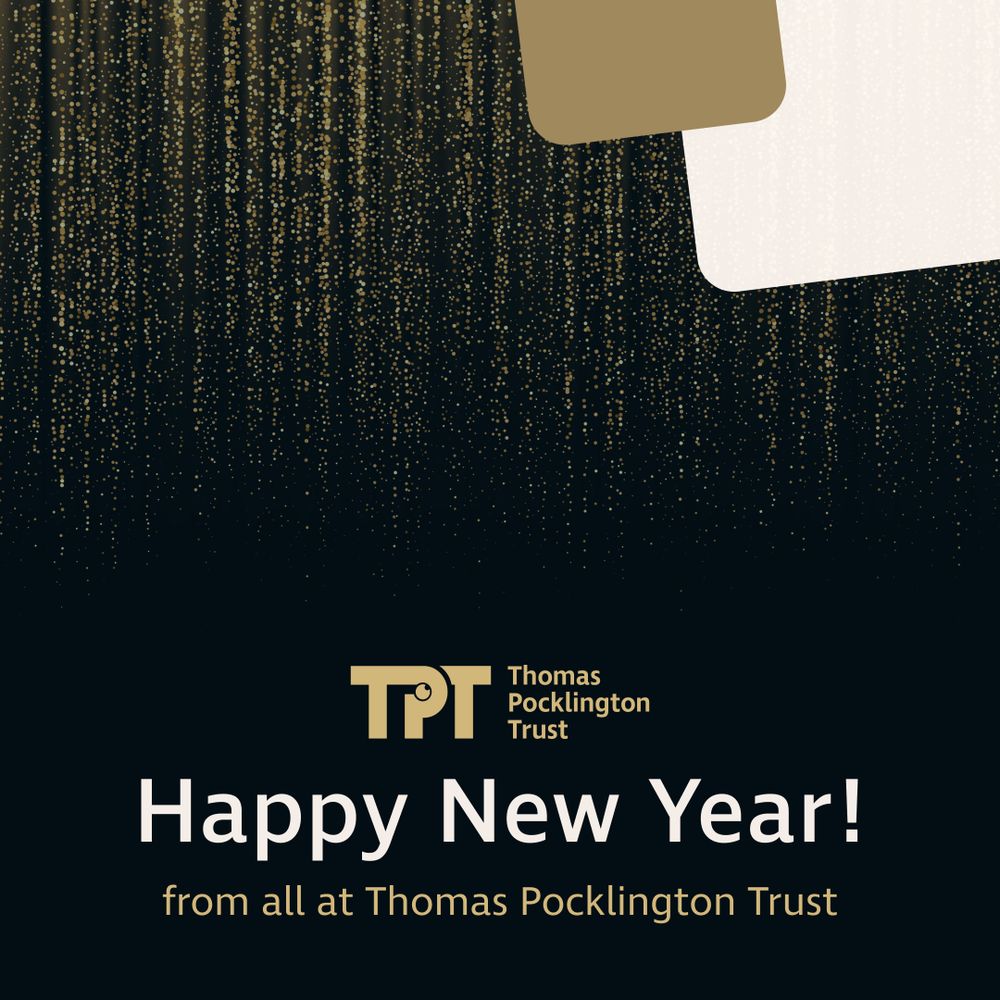  Illustration of golden glitter falling on a black background, with decorative rectangular graphical elements on the top right corner in gold and white. The TPT logo is placed near the bottom of the image followed by text which reads: Happy New Year! from all at Thomas Pocklington Trust.
