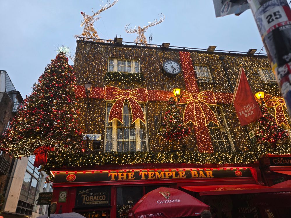 The Temple Bar in Dublin, Ireland, covered in Christmas light display. 