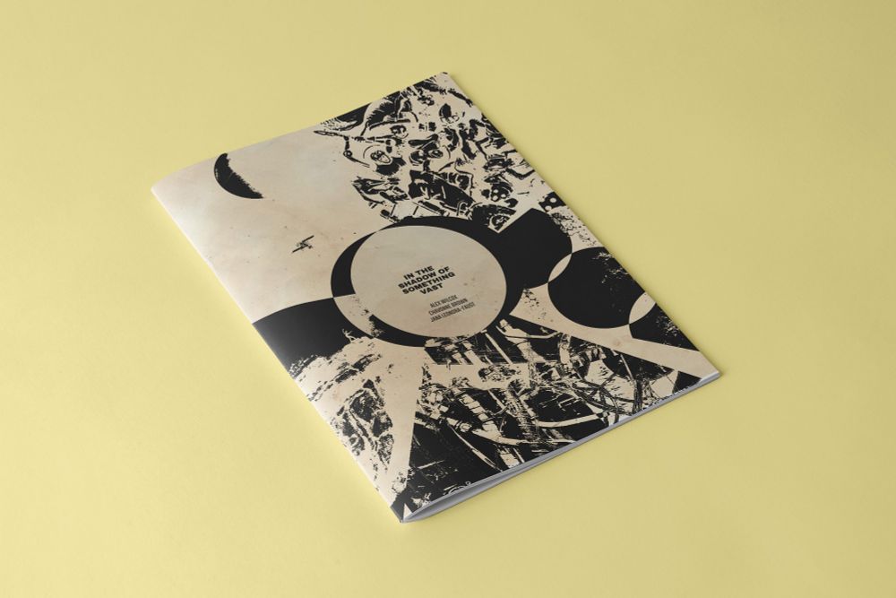 A mockup of an A4 sized zine in light brown and black. Top left is a shadow of a planet and a space station. Top right is a bunch of imps attacking a guy in a nightcap. Bottom right are three large circles. Bottom middle is a bunch of complex machinery. Bottom left is a guy on a cliff wailing his arms in the air from a really long distance away.