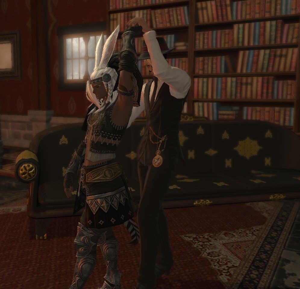 An elezen and viera dance in a study together. The atmosphere is quiet, the mood comfortable, the pair deeply in love.