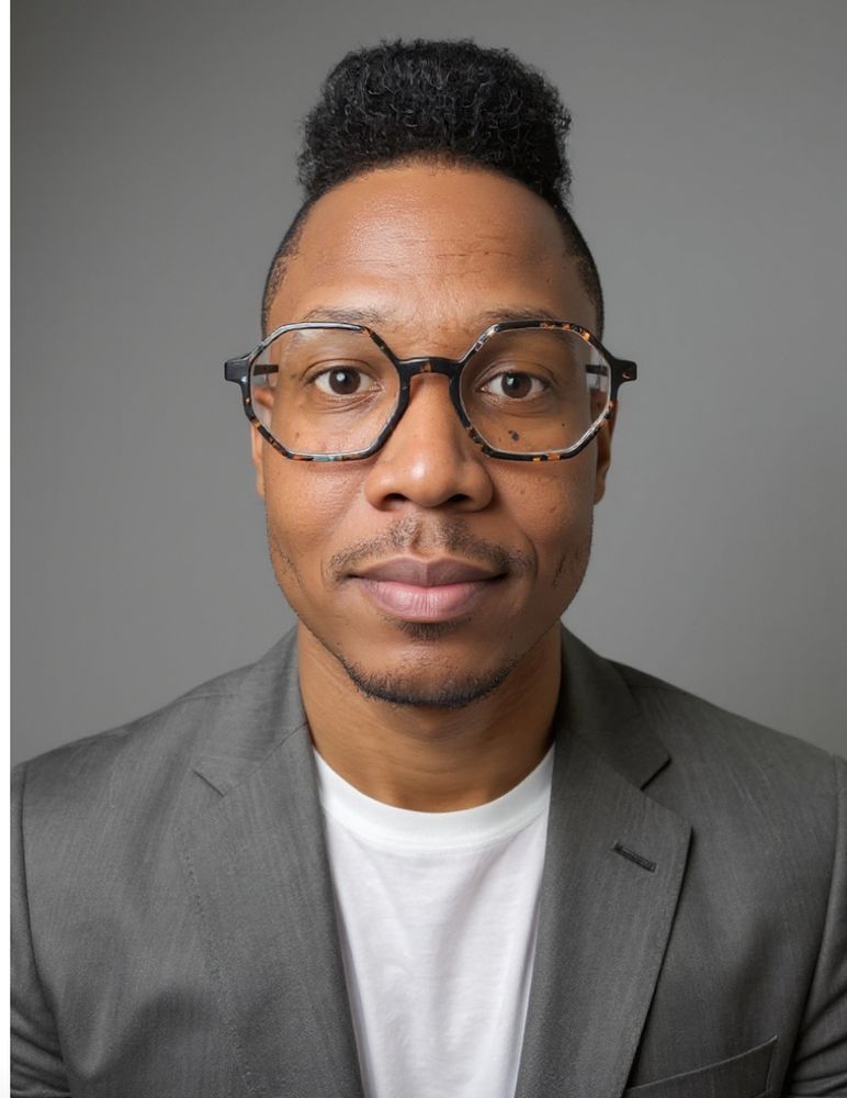 AI generated picture of a man in a suit with glasses staring into the camera