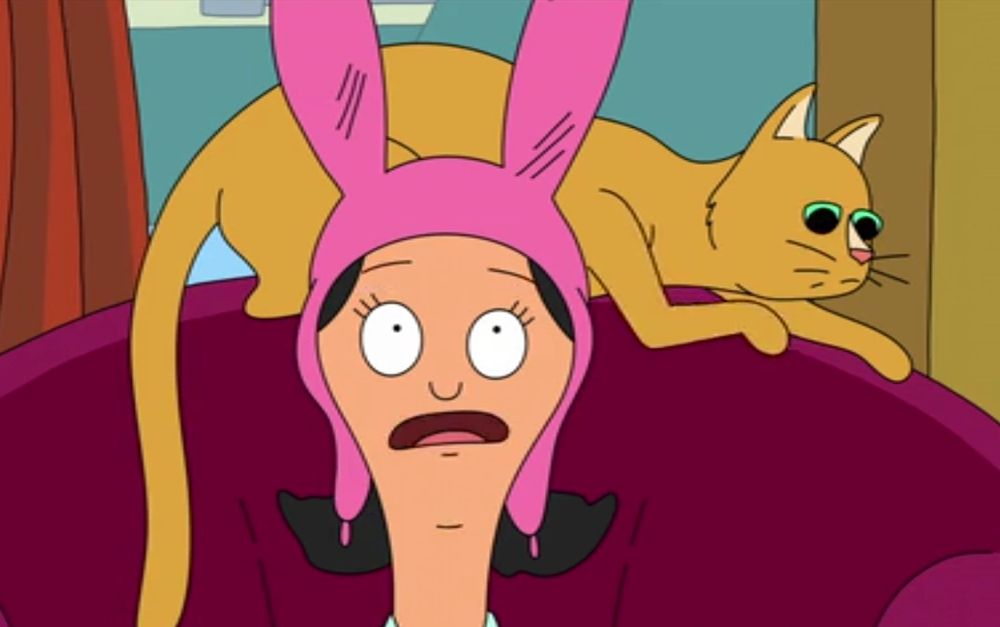 Louise Belcher with an orange cat behind her