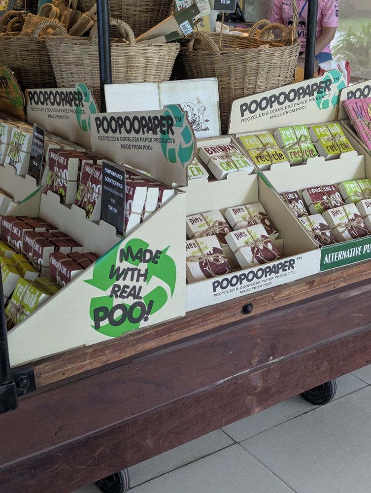 A vendor sign that says "Made with Real Poo!"