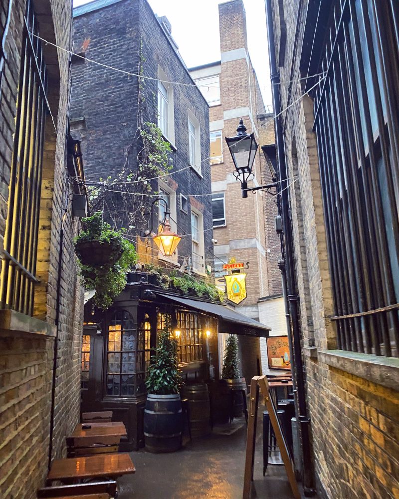 A historic London pub at the end of an alley. 