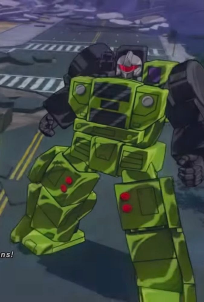 a screencap of long haul from transformers: devastation just standing there, menacingly!