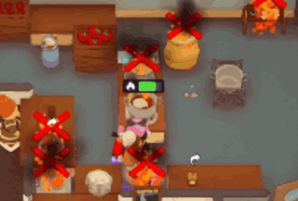 a video game scene with red crosses on the stove and pots and pans