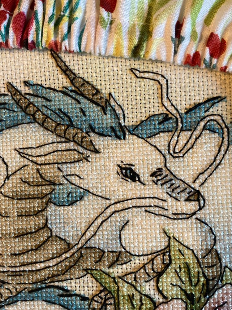 Haku from Spirited Away in cross stitch form.