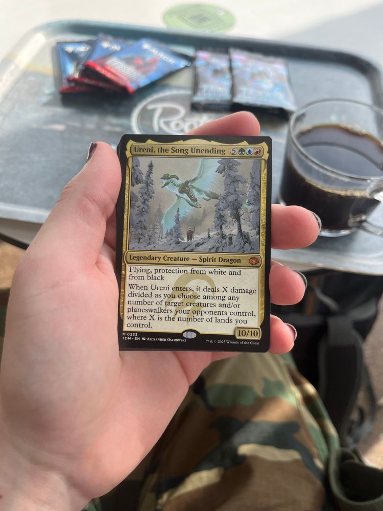 Photo of a magic the gathering card; ”Ureni, the Song Unending”.