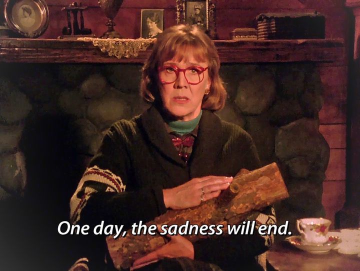 Catherine Coulson as "The Log Lady" from Twin Peaks, with the caption "One day, the sadness will end."
