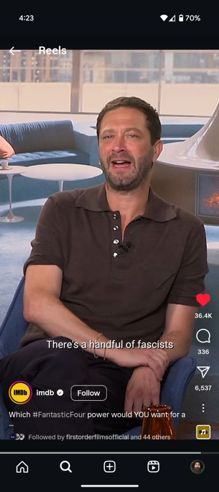 Ebon Moss-Bachrach in a chair saying "There's a handful of fascists..."