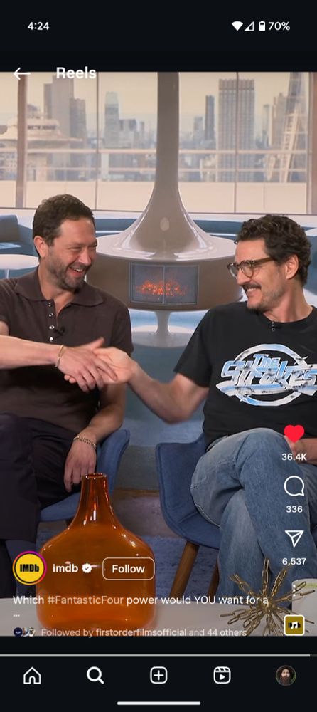Ebon Moss-Bachrach and Pedro Pascal slap hands while laughing with joy about killing fascists.