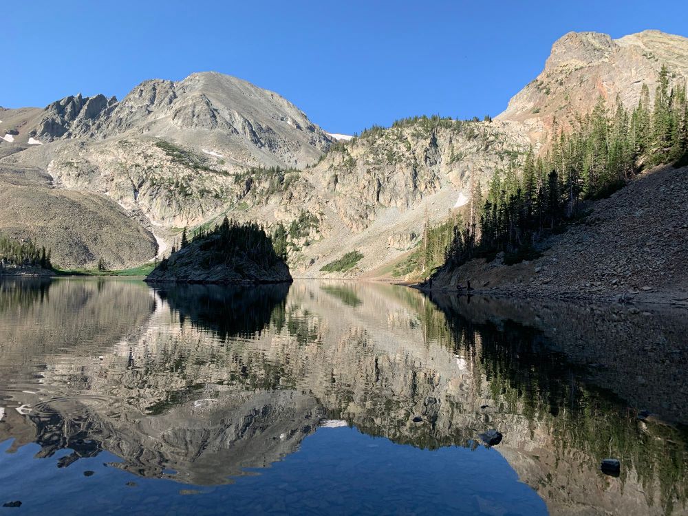 Jagged mountains reflected in a lake