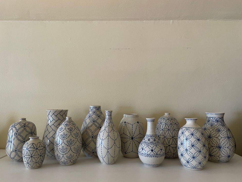Blue and white vases with stitching design 