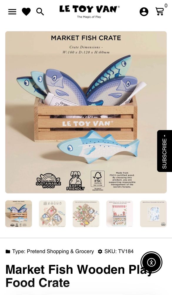 an online listing for carved and painted wooden fish in a crate