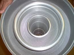 A photo of the top of the fuel in the High Flux Isotope Reactor. There are hundreds of individual fuel plates, each one curved so that the coolant gap between plates is constant going from the inner to the outer radius.