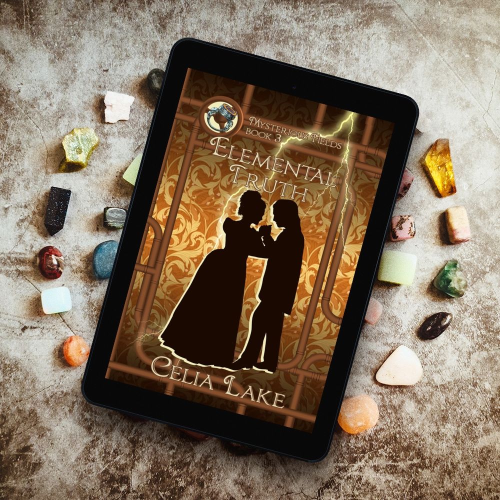 Elemental Truth by Celia Lake displayed on a tablet resting on circles of tumbled stones of many different colours and a brown stone floor. The golden damask background and steampipes frame the man and woman in 1890 Victorian dress, now waltzing together. Lighting shoots down from the top right, and a ring is inset in the top left corner. 