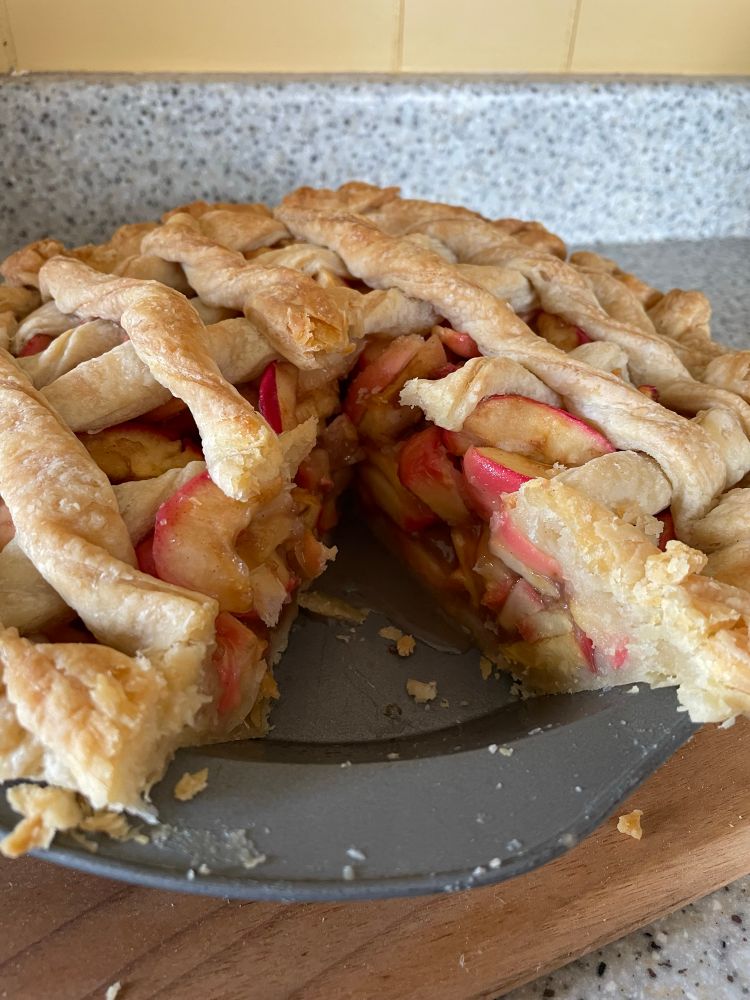 An apple pie with lattice crust made with honeycrisp apples from my yard.