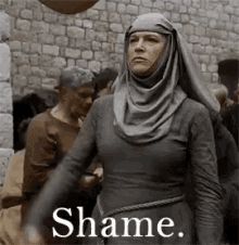 Scene from Game Of Thrones where the nun is ringing a bell and chanting shame 