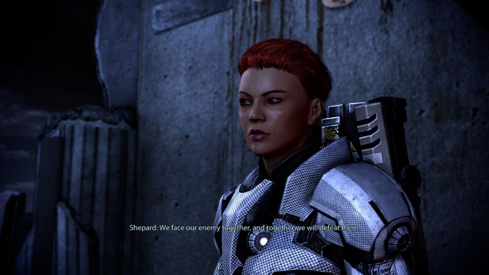 Screenshot of Mass Effect 3 with Shepard's last speech to their crew. Her line in the screenshot is "We face our enemy together, and together we will defeat them."