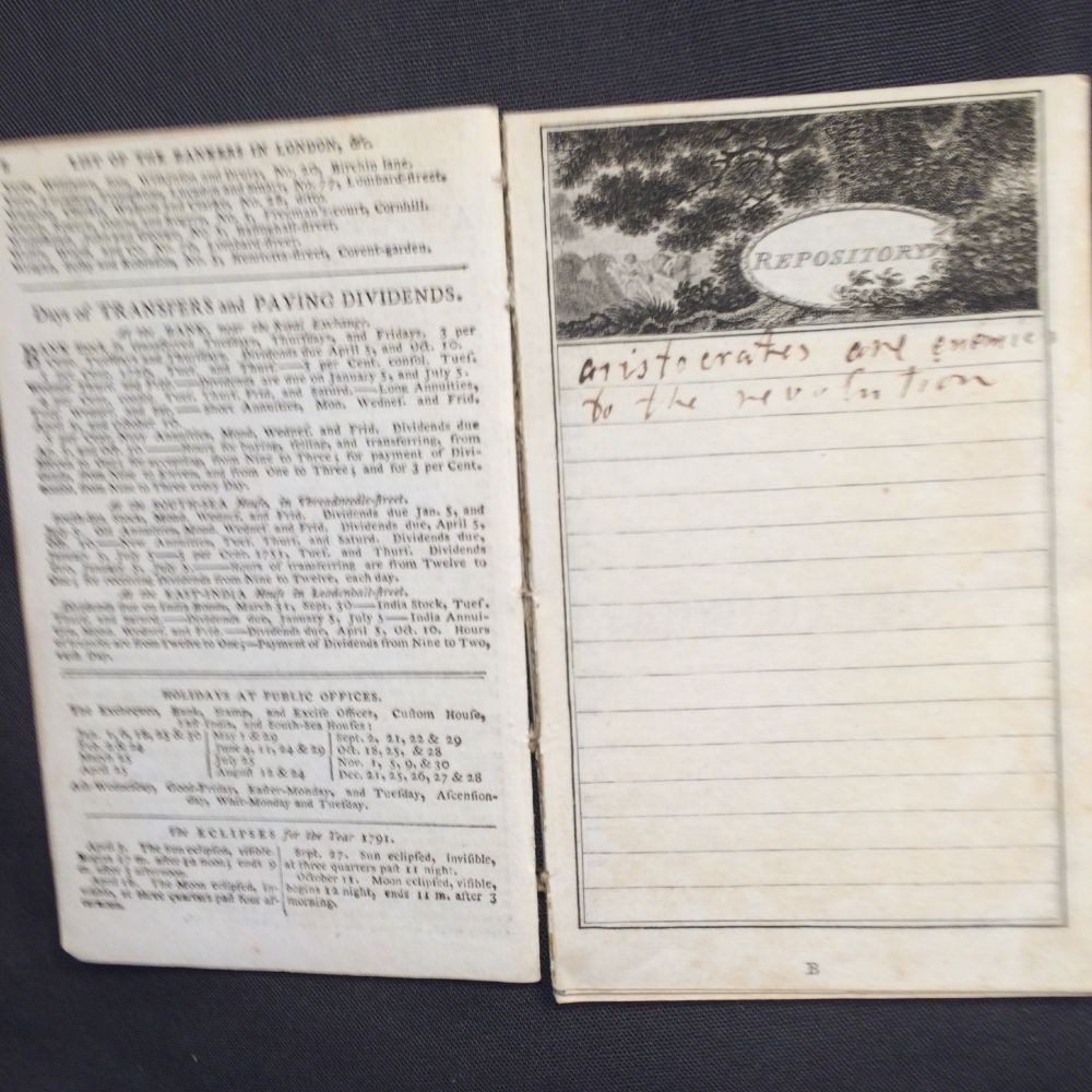 Facing the page listing bankers in London, days for transfers and paying dividends, holidays at public offices, and eclipses for the year 1791 is another page on which is written "aristocrats are enemies to the revolution" 