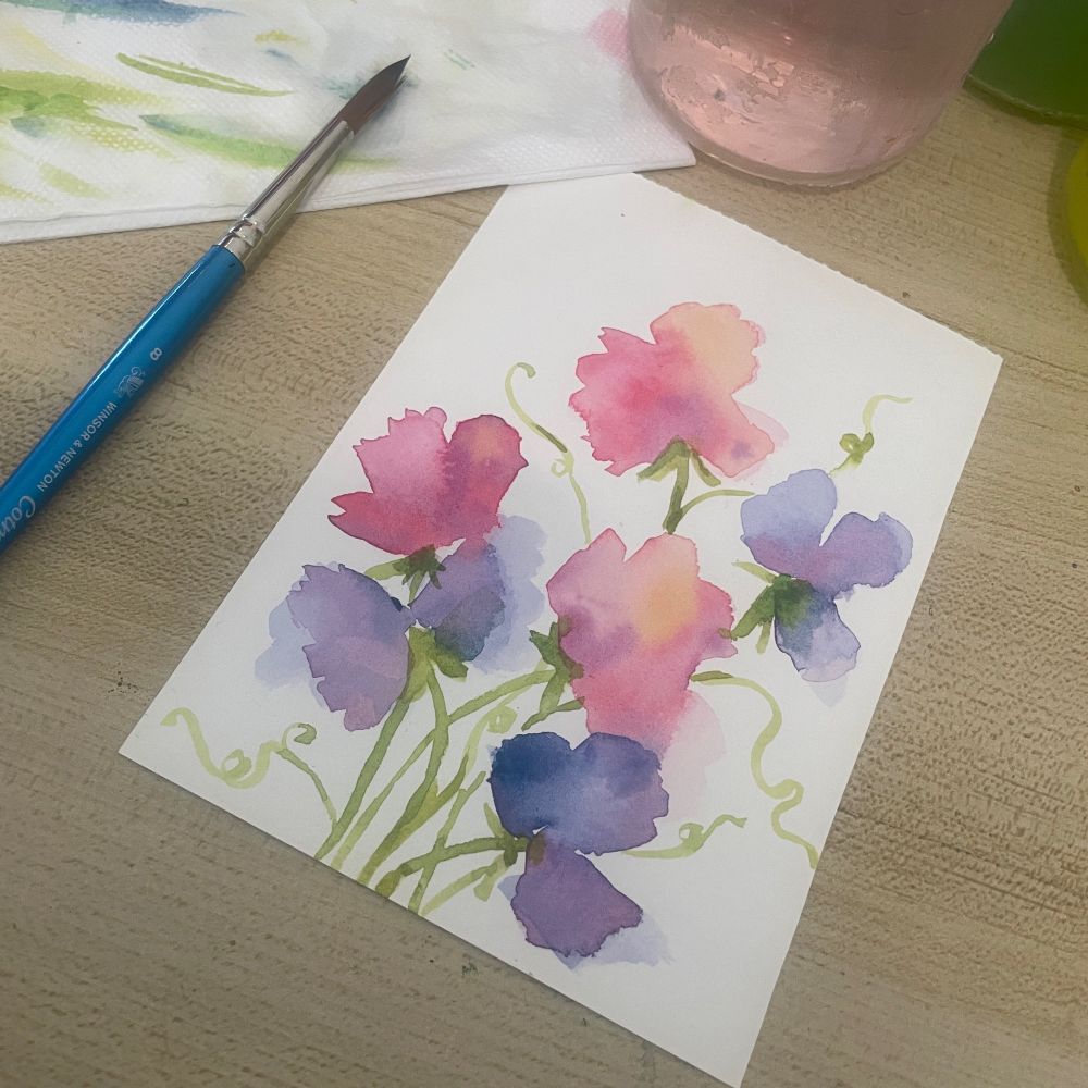 Watercolour painting in a very loose style, of pinky peach and purple sweet peas with swirly bright green stems.