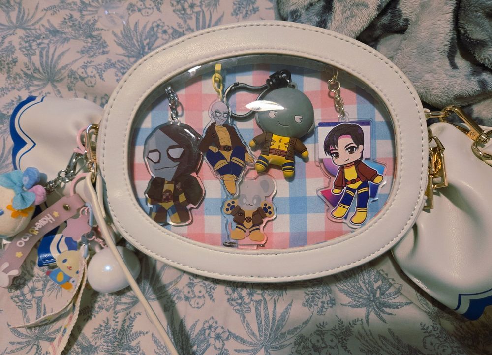 image of a candy shaped ita bag with keychains of morph
