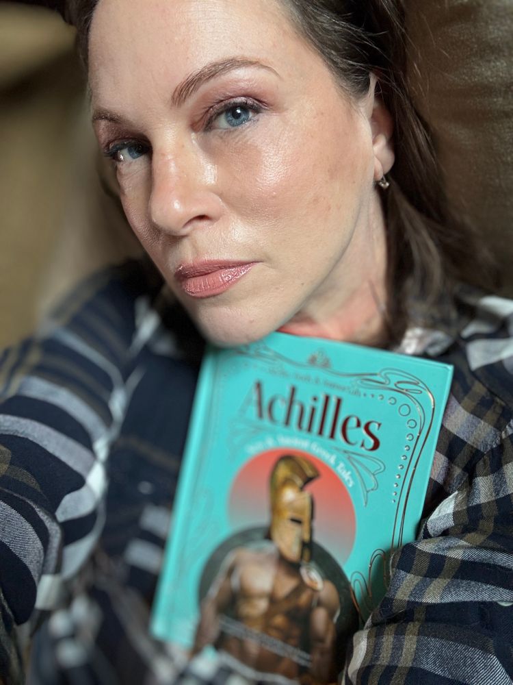 I cradle against my bosom, a copy of Achilles, a brand new anthology from flame tree press.