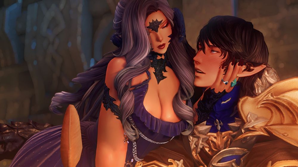 sayana and aymeric in a library, lit by candlelight. sayana wears an indigo dress with a low cut neckline, leaning over a table to cup aymeric's face in her hand as she leans in close to him. she looks down at him, and he looks up at her with a deep blush on his cheeks.