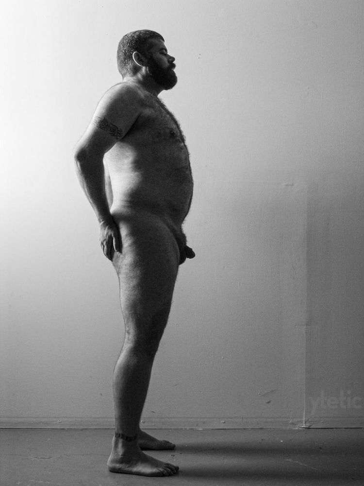 Four BW studio photos. Nude in all.
1. Standing profile, hands on bum.