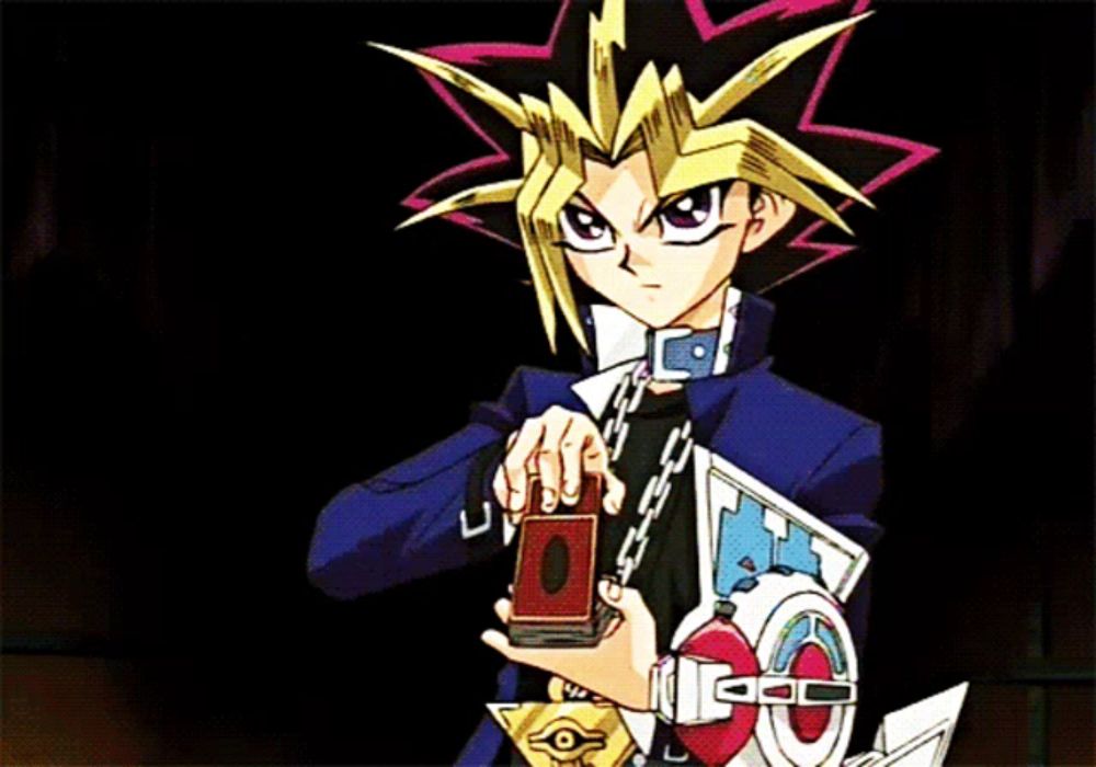 a cartoon character with a chain around his neck holding a card