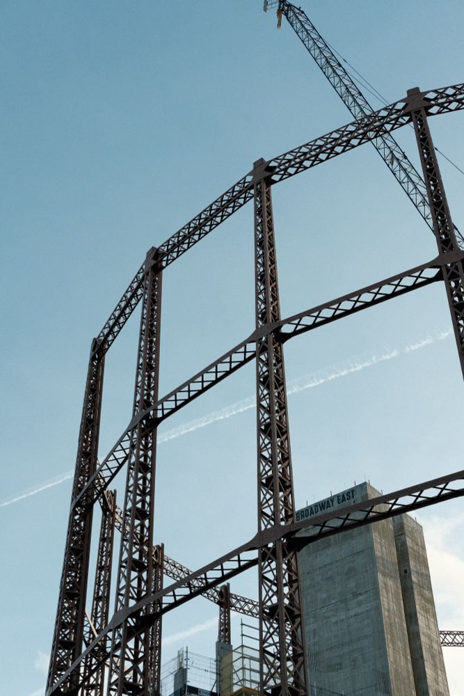 An old gasholder with construction happening inside