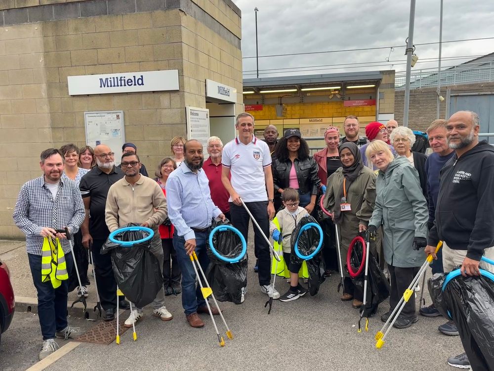 Group of litter pickers outside Millfield Metro Station
