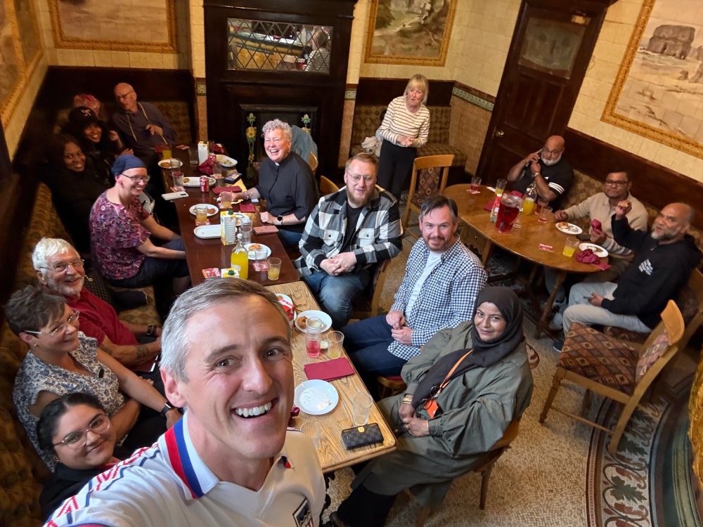 Selfie of Lewis Atkinson MP with Group in pub enjoying food and drink