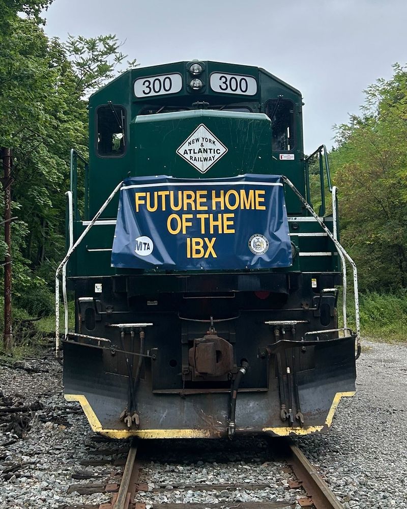Image of train with a banner that says "Future Home of the IBX"