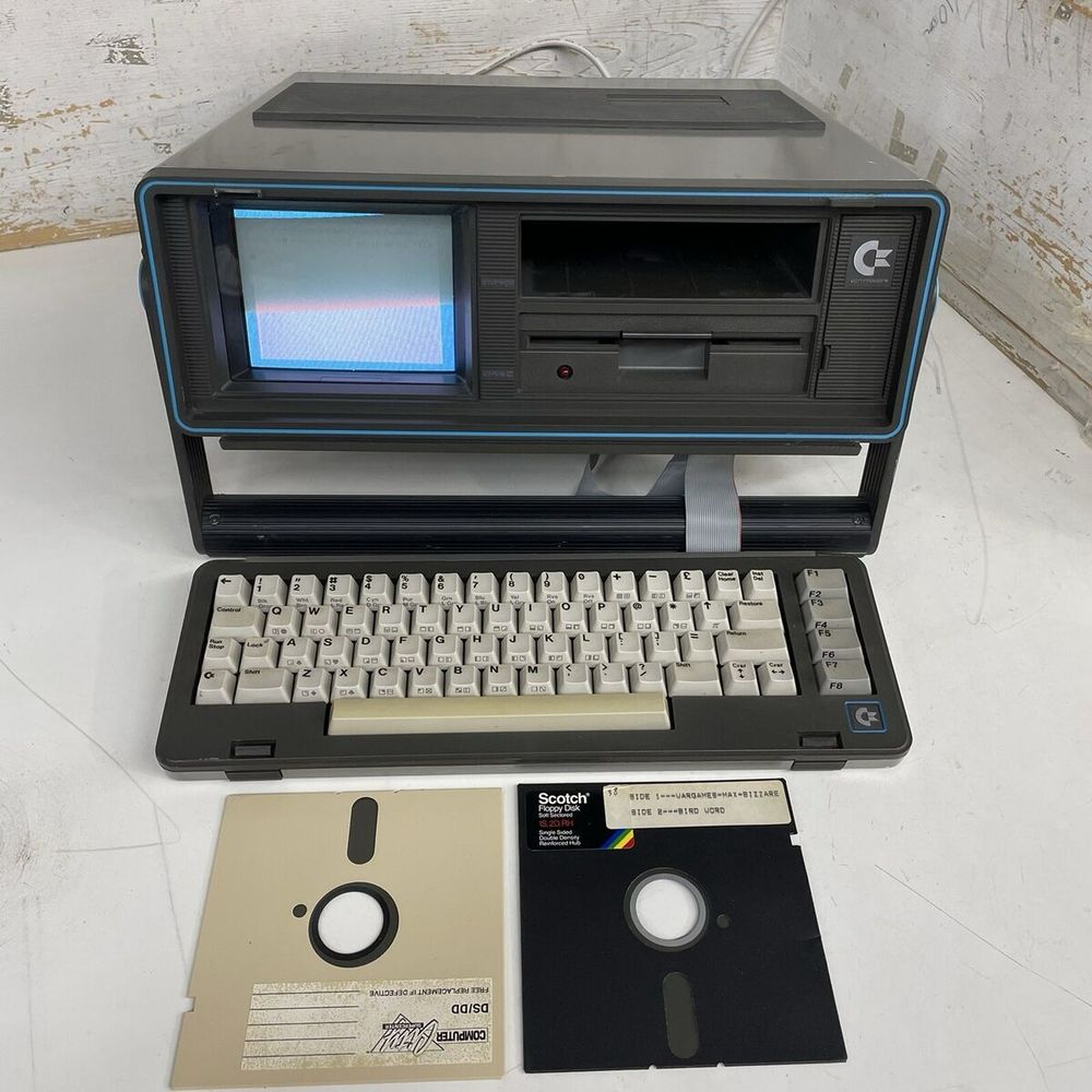 Pic of a 1980’s Commodore portable computer with floppy discs