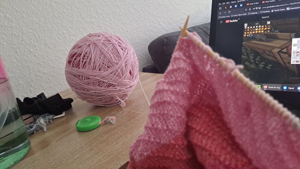 The same image but the ball of yarn is in focus. 

