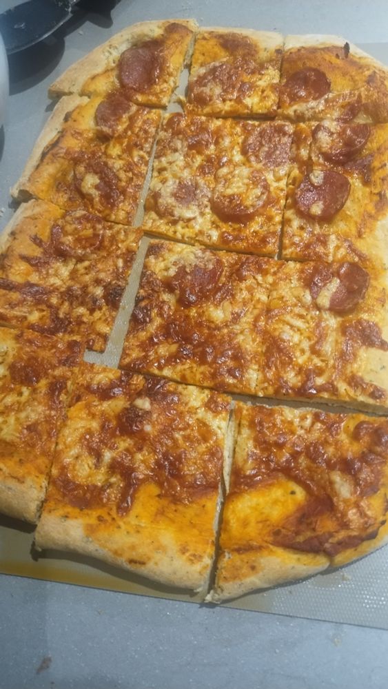 Half pepperoni half cheese pizza