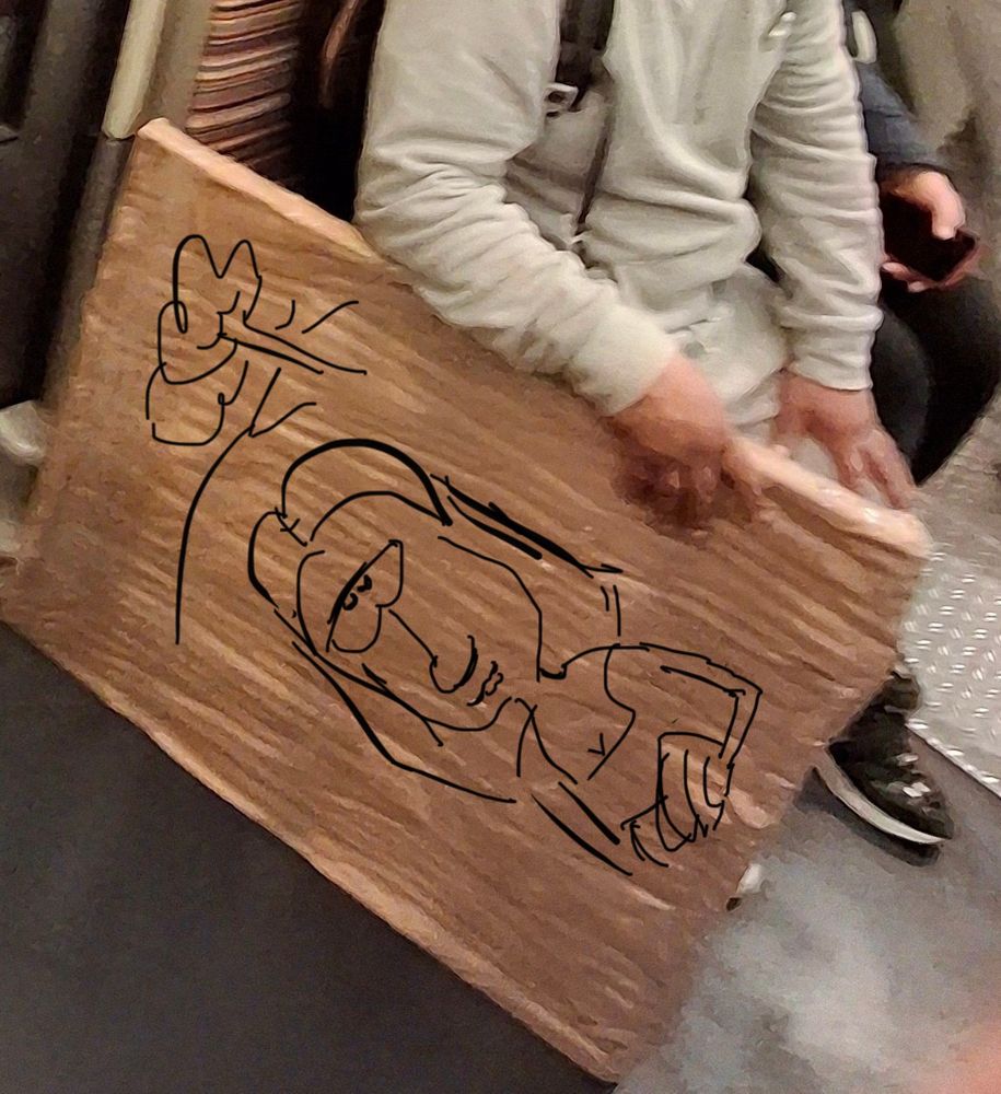 La joconde dessinée sur le carton
( très mal)