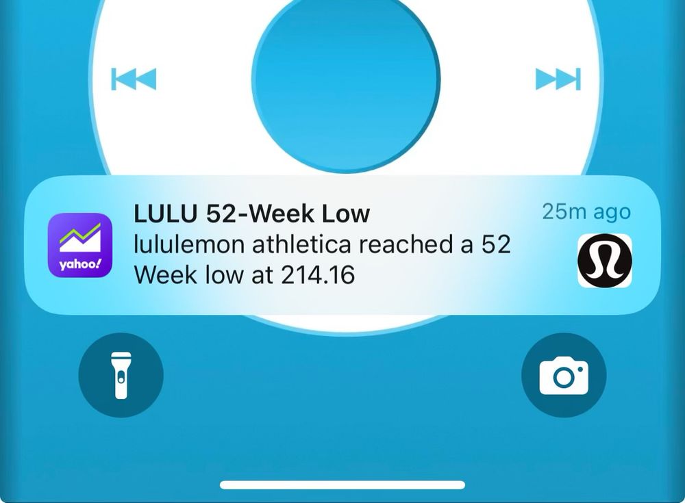 Stock market notification on iOS Lock Screen: “LULU 52-Week Low: lululemon athletica reached a 52 Week low at $214.16”