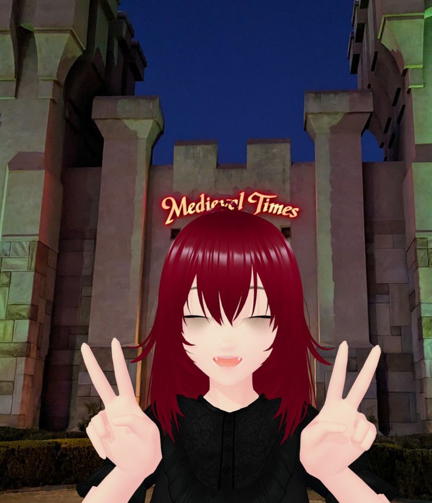 a virtual avatar posing in front of medieval times 