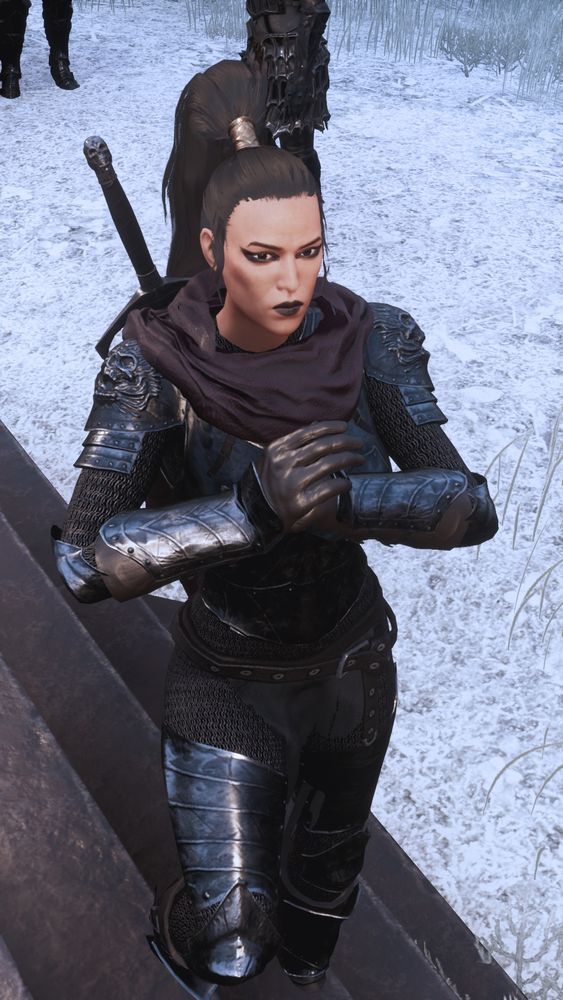 Female character from conan exiles woth plate armor and black hair tied in a high ponytail