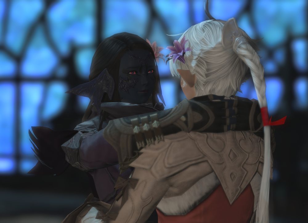A close up picture showing Sari's nervously happy expression as she and Alisaie dance together.