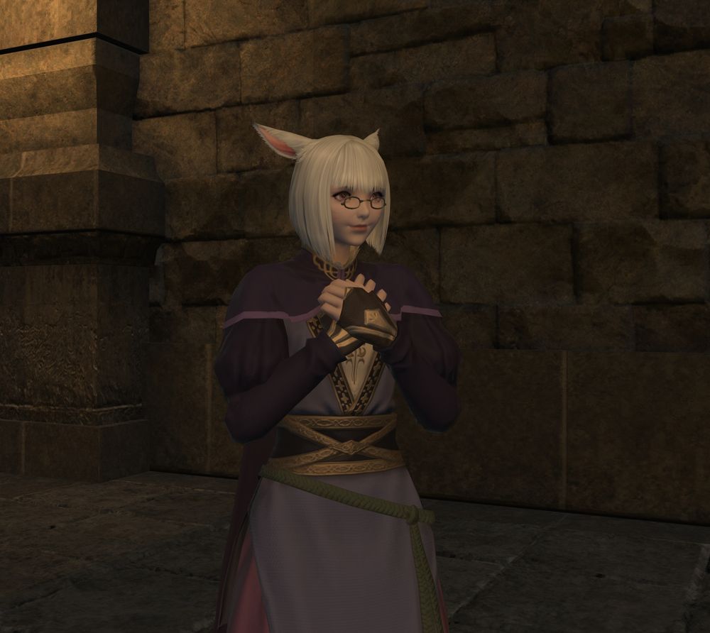 A picture of F'lhaminn standing in the Dawn's Respite, clutching her hands to her chest as she smiles.